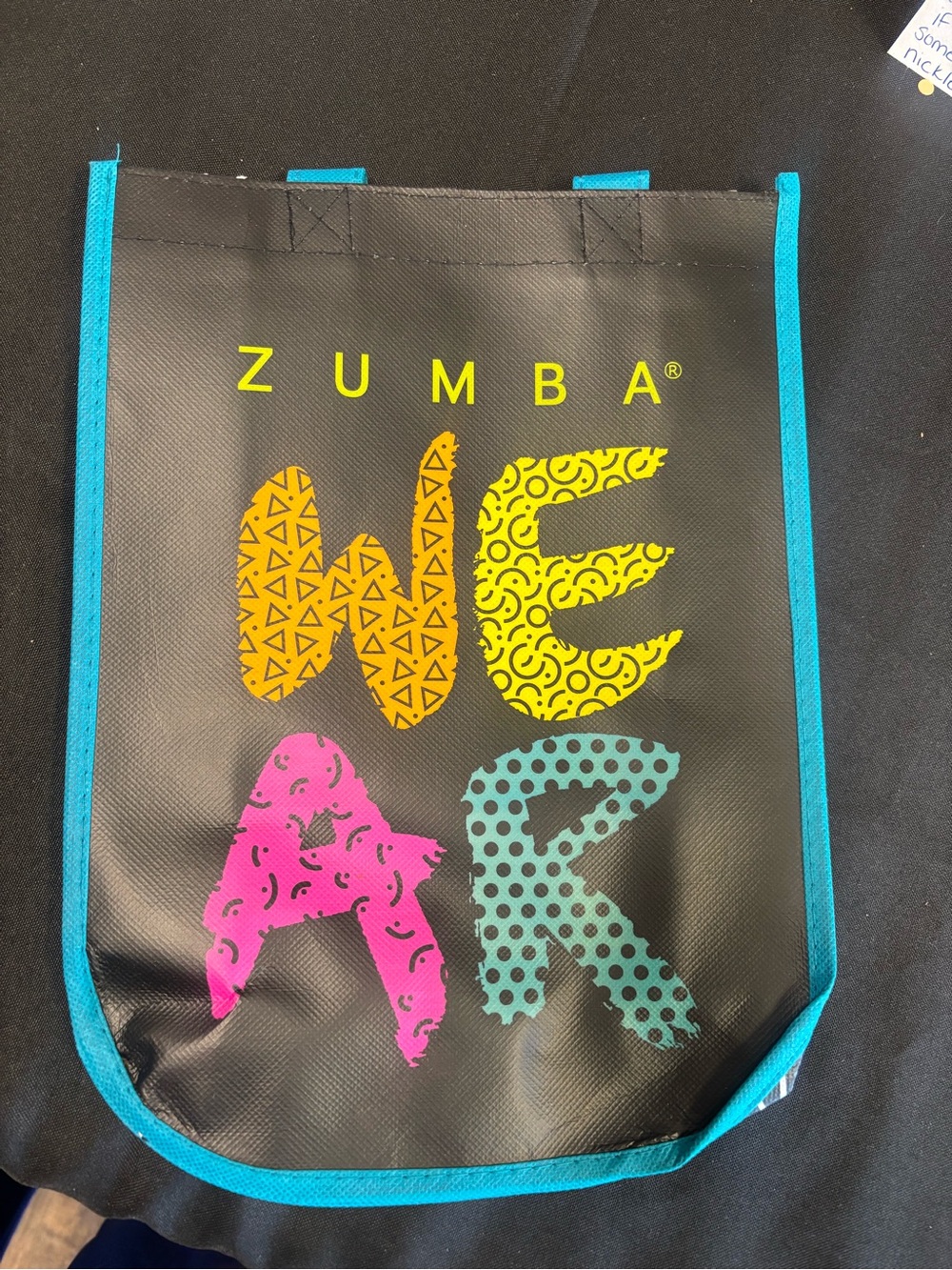 Zumba Women's Black Tote Bag with Turquoise Trim and Multicolor 'WEAR' Design